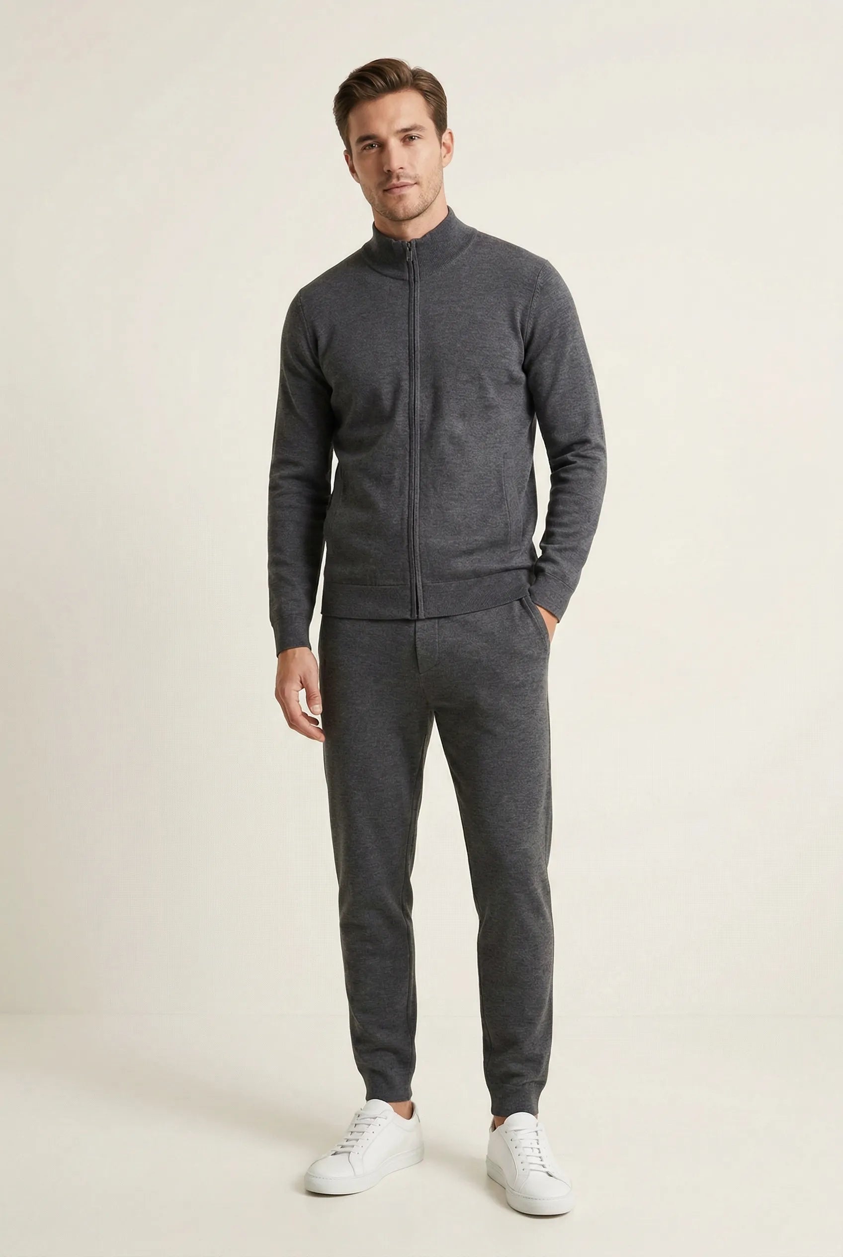 Man wearing a charcoal premium tracksuit